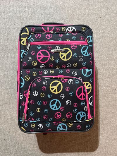 NA Like new Carry On Luggage Rolling expandable. Used 1X