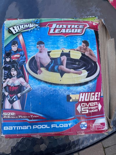 Brand new huge Batman pool float box looks Worn and ripped as seen in picture but still brand new