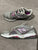 New Balance Very good  condition. Grey with purple 7-1/2 (Adult)