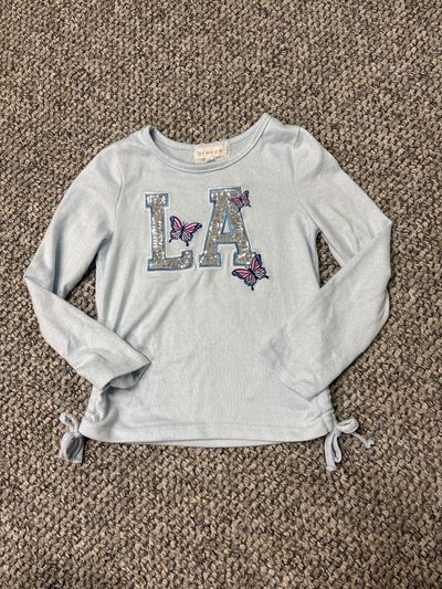 Btween Light blue plush long sleeve w sequin LA 7-8