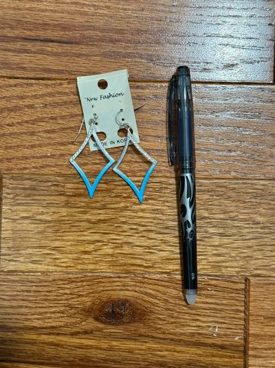 NWT Silver, blue, and sparkly earrings. Pen for size