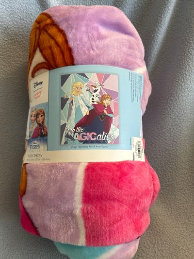 Brand new! Disney Frozen Anna and Elsa Brand new! Frozen plush throw size 50x60 retails 40.00!