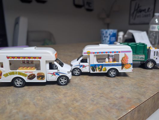 Unknown 3 trucks,ice cream, food truck and garbage truck