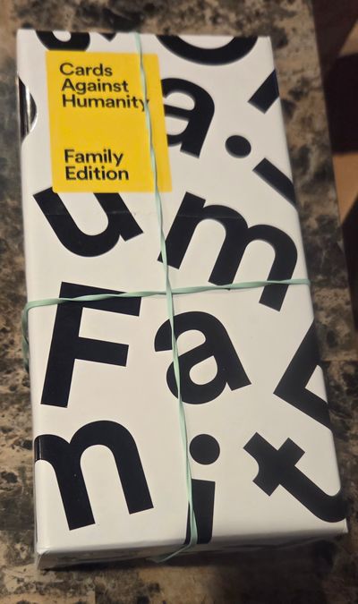 New but unwrapped Cards Against Humanity Family edition retails $29