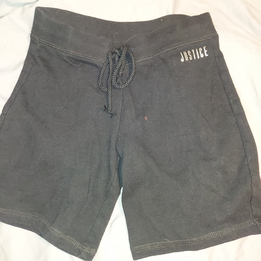 Justice Black shorts  tiny mark as shown 7-8